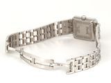 a close up of a watch on a white surface with a white background