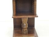 a small wooden table with a shelf on top of it