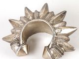 silver plated ring with spikes and spikes on it
