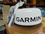 a large white sign that says garmin on it