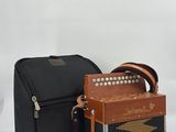 two accordions sitting next to each other on a white background
