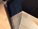 a cell phone that is sitting on a wooden table