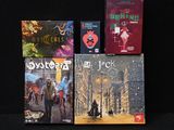 un grand nombre de livres posés sur une table