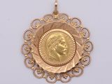 l'image d'une pièce d'or sur laquelle figure le visage d'une femme