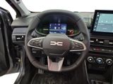 the interior of a car with a steering wheel and dashboard controls