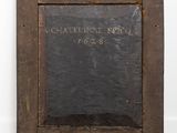 an old wooden picture frame with a black chalkboard on it