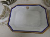 a white plate with a blue border on a table