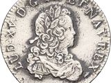 a close up of a coin on a white background