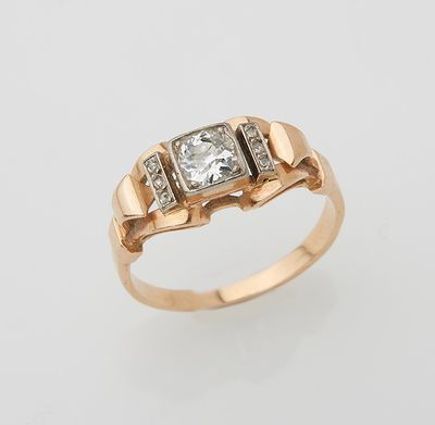 a gold and diamond ring
