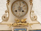 a clock that is sitting on top of a table