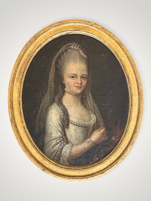 an oval portrait of a woman in a white dress with a veil