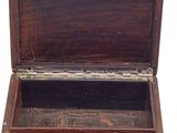a small wooden box with a lid on a white background