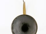 an image of a black and gold trumpet on a white background