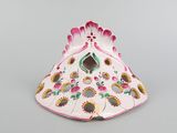 a white and pink birdhouse with sunflowers on it