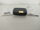 an image of a remote control sitting on top of a table