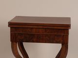 an image of a small wooden table with a drawer