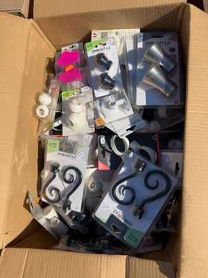 a cardboard box full of assorted items that are in it
