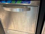 stainless steel dishwasher in a kitchen next to a counter top