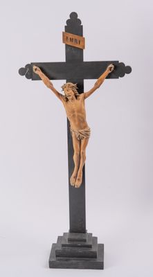 statue of jesus on the cross on a white background