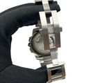 a person holding a watch in their hand on a white background