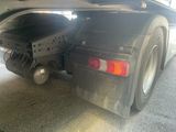 a truck that is parked on the side of the road