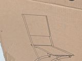a cardboard box with a picture of a chair inside of it