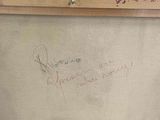 a picture of a piece of art with writing on it