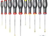 six different types of screwdrivers lined up in a row