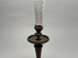 an image of a glass vase on a stand on a white background