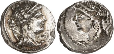 a silver coin with an image of a man on it