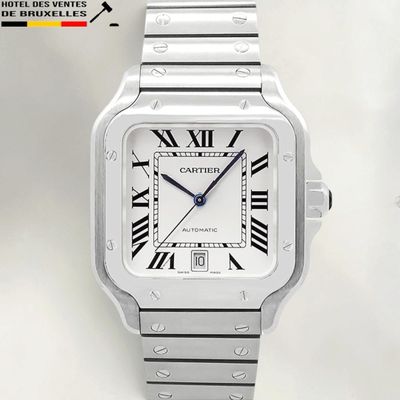 a close up of a wrist watch with roman numerals on it