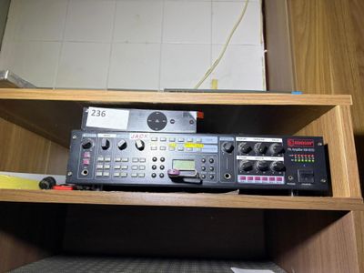 a radio set up on top of a shelf in a room
