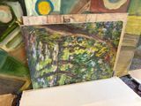 a picture of a painting being displayed on a table