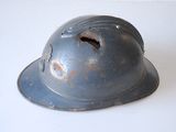 a helmet with a hole in the middle of it