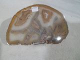 a picture of a piece of rock with a tag on it