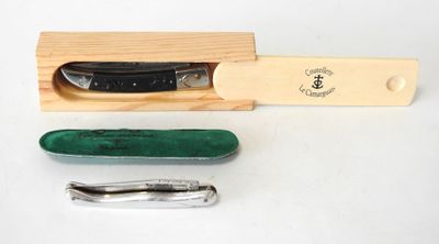 a knife and a knife sharper sitting on a table