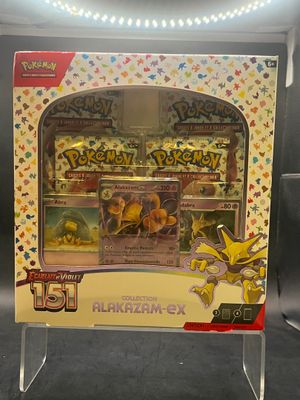 a close up of a display case with a pokemon figure in it