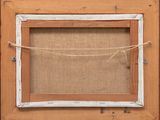 an old picture frame with a rope hanging from it ' s side