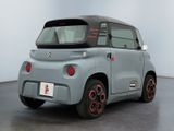 an image of a small electric car in a room