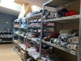 a room with a lot of items on the shelves