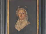 portrait d'une femme vêtue d'une robe noire et portant un foulard blanc sur la tête
