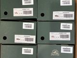 several boxes of assorted items are stacked on top of each other