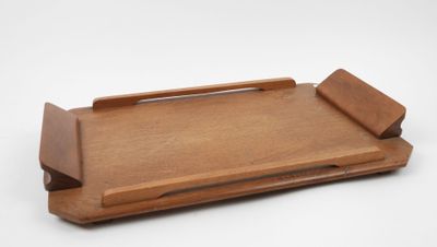 wooden serving tray with handle on a white background