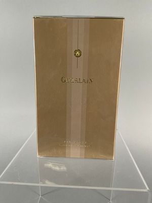 the box is clear and has a gold logo on it