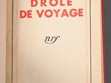 an open book with a picture of a woman in a red dress