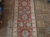 a long rug on the floor in a room