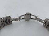 an image of a stainless steel bracelet on a white surface