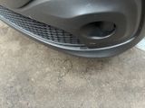 a close up of the front bumper of a car