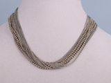 a close up of a necklace on a mannequin mannequin mannequin mannequin mannequin mannequin mannequin mannequin