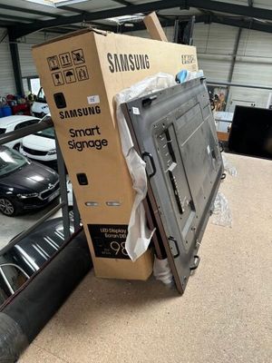 a box that is sitting on top of a tv